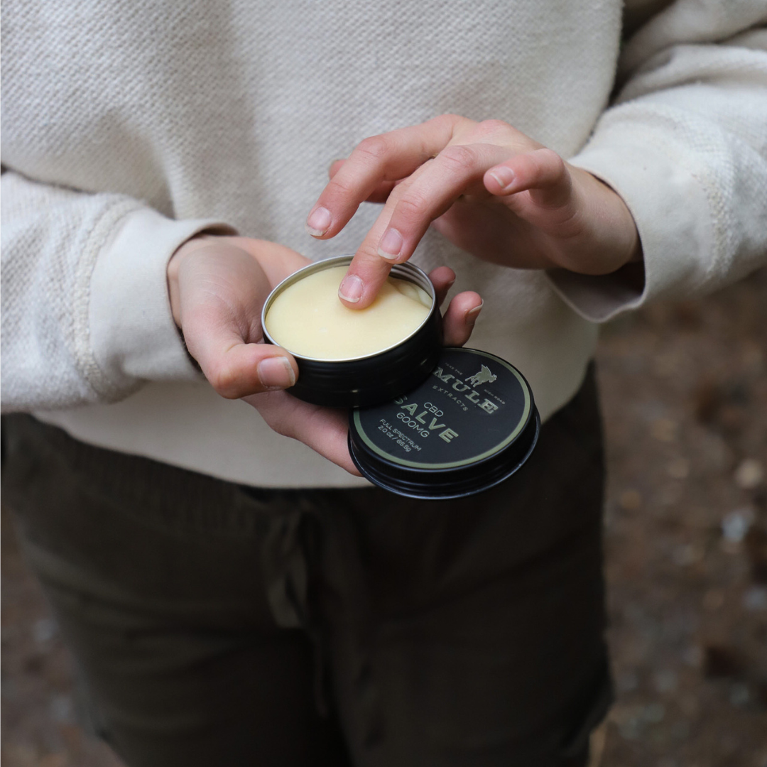 CBD Salve Solo Product Open Hand Held with Model